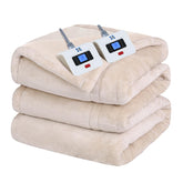Sealy electric blanket on beige bed provides fast, even warmth across the queen surface.