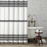 Seasonwood black and white shower curtain tassels brighten the bathroom with stylish boho detail