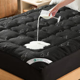 Secgo premium mattress topper on a bed provides plush support for better sleep.