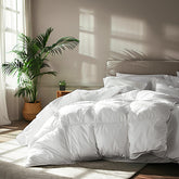 Serta goose feather down fiber comforter close-up shows fluffy fill and soft cotton cover