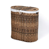 Seville Classics handwoven oval laundry hamper with artisan weave for organized laundry sorting.