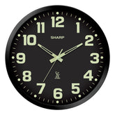 Sharp glow-in-the-dark atomic clock numbers illuminate the time clearly at night
