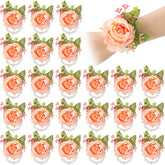 Sherr pink wrist corsage roses for bridal elegance and bridesmaid styling.
