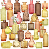 SHOHAYTO colored glass vases with assorted embossed vintage designs for chic centerpieces.