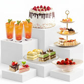 Silanit 6-piece buffet risers set for tiered food display.