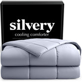 Silvery Cooling Comforter fabric close-up with silver-infused fibers regulating temperature.