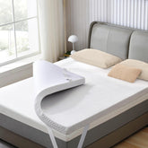 SINWEEK two-inch gel memory foam topper on bed for enhanced support and pressure relief.