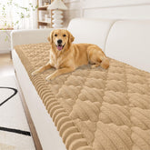Smiry pet couch cover on camel sofa protects from fur and scratches.