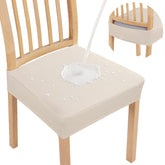 Smiry waterproof seat covers on dining chairs protect upholstery from spills and stains.