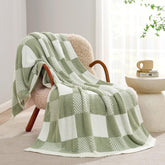 Snuggle Sac checkered blanket in sage green adds cozy texture to your couch.