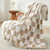 Snuggle Sac beige checkered throw blanket showcases plush faux fur texture for luxurious lounging.