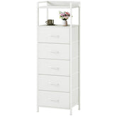 Somdot tall dresser with five fabric drawers in the bedroom keeps clothing organized.
