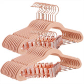 SONGMICS 24-pack pants hangers with rose gold clips for organized, sparkly storage.