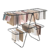 Songmics clothes drying rack with foldable 2-level design and 33 rails for large loads.