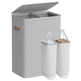 Songmics laundry basket front view with two compartments for easy sorting