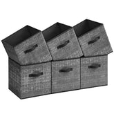 Songmics storage cube showing foldable bottom board for quick setup
