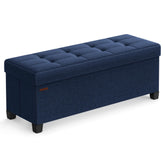 SONGMICS storage ottoman bench with tufted lid offers inviting seating.