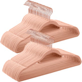 Songmics velvet hanger with non-slip surface keeps clothes secure.