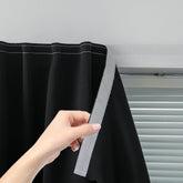 Sovtfides adhesive blackout curtain panel ready for peel-and-stick installation in a modern bedroom