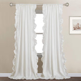 StangH ruffle curtains in the bedroom add soft privacy and romantic texture.