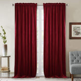 StangH Theater Red Velvet Curtains closeup velvet texture enhances luxurious room feel.