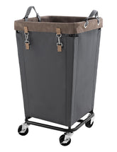 StorageWorks 160L laundry basket with wheels for smooth transport.