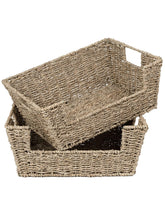 StoragWorks wicker basket on pantry shelf keeps spices and cans neatly organized.