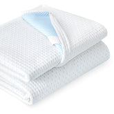 Subrtex mattress topper cover in white on bed protects your topper.