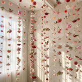 Suncalla pink flower garlands backdrop for festive events creates a soft romantic mood.