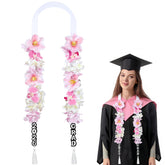 Suncalla graduation leis pink flowers close-up enhances photos with vibrant tropical charm.