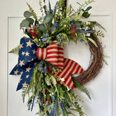 Suncalla Patriotic Wreath on front door with burlap bow for curb appeal