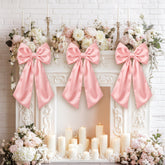 Suncalla pink satin bow wall decor creates a bold wedding backdrop focal point.