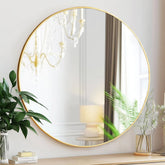Sunniry Gold Round Mirror 24in front view enhances natural light in any room.
