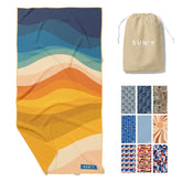 SUN'Y sand-free waffle microfiber towel keeps sand at bay for a clean beach day.