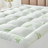 SurChic queen-size topper with bamboo viscose surface for breathable comfort.