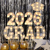 Suyeah Grad 2026 letters glow on desk for a festive display.