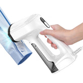 Sweepulire vacuum steamer grips fabric for one-handed use.