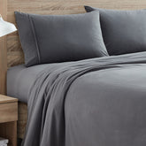 Sweet Home Collection flannel sheets fitted with corner straps for secure mattress fit.