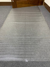 Sweet Home Stores Clear Vinyl Carpet Protector shown on a hallway floor, keeping carpets visible and protected.