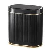 SYNCVIBE bathroom sensor bin lid opens hands-free for quick disposal.