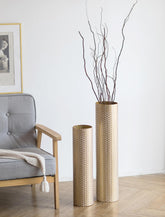 Sziqiqi tall gold floor vase with woven texture enhances rustic elegance in living spaces.