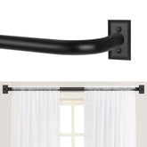 TANGWIN black wrap-around rod ends for full window coverage and privacy.