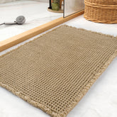 tchdio Waffle Bath Mat shows absorbent surface soaking up water quickly for a dry floor