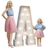 Teebloom 4ft marquee letter A lit adds warm ambiance for events.