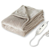 Tefici heated blanket throw on bed for cozy warmth