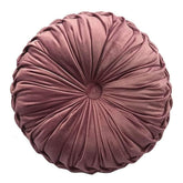 Teieas round velvet pillow with pleated design adds elegant color to a couch
