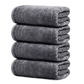 Tens Towels pack of four extra-large 30x60 towels, offering generous coverage for full-body wraps.
