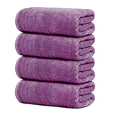 Tens Towels pack of four purple bath towels 30x60 inches, quick-drying and absorbent.