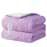 Texciting heated blanket on bed delivers cozy warmth for chilly nights.