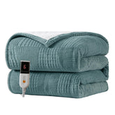 Texciting heated blanket on bed and couch provides versatile warmth